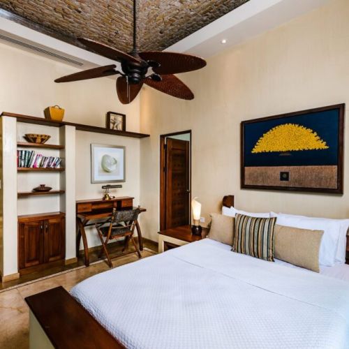 Bright and inviting guest bedroom featuring authentic Costa Rican décor, combining comfort and local charm for an unforgettable Tamarindo stay.