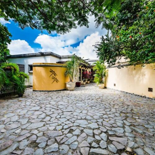 The entryway of this Tamarindo rental sets the tone for a relaxing and luxurious stay.”

“Inviting entry to your Tamarindo home, connecting outdoor beauty with modern interior design.